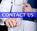 Technology, internet and networking in medicine concept - medical doctor presses contact us button on virtual screens Royalty Free Stock Photo