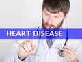 Technology, internet and networking in medicine concept - medical doctor presses heart disease button on virtual screens Royalty Free Stock Photo