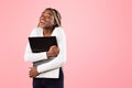 Technology Lover. Excite black woman hugging personal laptop computer Royalty Free Stock Photo