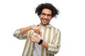 smiling young man in glasses showing smart watch Royalty Free Stock Photo