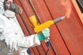 Polymer coating of metal detail with powder spraying gun Royalty Free Stock Photo