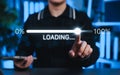 Technology Progress and Digital Loading Bar Concept. Person interacts with loading bar progressing from 0% to 100%, representing Royalty Free Stock Photo