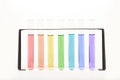 Technology / science: Multi color liquid in test tubes in a rack. Graphical representation for a bar chart, statistics or data. 6