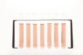 Technology / science: Test tubes in a rack. Graphical representation for a bar chart, statistics or data. 3