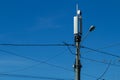 Technology on the top of the telecommunication 4G,LTE GSM tower antenna, transmitter, blue sky. Royalty Free Stock Photo