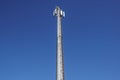 Technology on the top of the telecommunication GSM 4G tower antenna, transmitter , blue sky, white clouds.