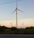 Technology wind energy sunset and road Royalty Free Stock Photo
