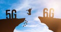 Techonology change from 5G to 6G, global wireless network. Silhouette man jumping from cliff to cliff on sky background