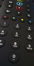 Tecnology -A black  Remote control for television Royalty Free Stock Photo