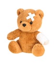 Teddy bear with bandage isolated on white, without shadow. Royalty Free Stock Photo