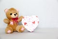 Teddy bear, box of chocolates and pink hearts with ribbon on white background, Valentine`s Day gifts, advertising banner Royalty Free Stock Photo