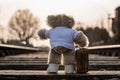 Teddy bear carrying his suitcase, saying goodbye, going on vacation, going out into the big, wide world Royalty Free Stock Photo