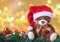 Teddy Bear in Christmas with Ball and Gift Box in Blur Backgroun Royalty Free Stock Photo