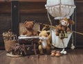 Teddy Bear. Cute miniature dolls made from mo-hair : Teddy Bear, fox and a monkey on the balloon. Vintage film grained filter with Royalty Free Stock Photo