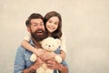 Teddy bear family member. Family relations. Fathers day concept. Lovely father and kid. Father and daughter light