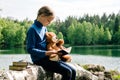 Teddy Bear is a fluffy toy for little cute girl. Every Child love Teddy Bear holding togethe to Picnic and read book Royalty Free Stock Photo