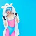 Teddy bear girl on a blue background. Crazy winter party. Club d Royalty Free Stock Photo