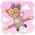 Teddy Bear girl is flying on a plane on a pink background