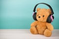 Teddy Bear with headphones with copy space