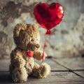 Teddy bear and a heart shaped balloon. Valentine\'s Day celebration Royalty Free Stock Photo