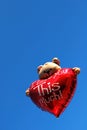 Teddy bear holding a heart Royalty Free Stock Photo