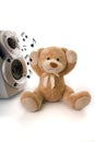 Teddy bear irritated by loud music Royalty Free Stock Photo