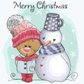 Teddy Bear in a knitted cap and snowman Royalty Free Stock Photo