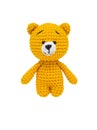 Teddy bear knitted crochet isolate on a white background. Selective focus. Royalty Free Stock Photo