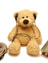 Teddy-bear listening music Royalty Free Stock Photo
