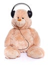 Teddy bear listening music Royalty Free Stock Photo