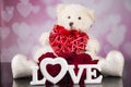 Teddy bear mascot, red roses and hearts for valentine`s day Royalty Free Stock Photo