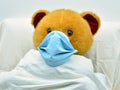 teddy bear with mask, sick of coronavirus in a hospital Royalty Free Stock Photo