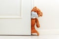 Teddy bear in mask stay at home in quarantine Royalty Free Stock Photo