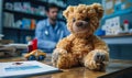 Teddy bear on a pediatricians desk symbolizing child-friendly healthcare, with a doctor in the background ready to provide Royalty Free Stock Photo