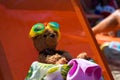 Teddy bear resting on a Cretan beach. Royalty Free Stock Photo