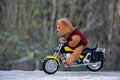 Teddy Bear sits on motorcycle Royalty Free Stock Photo