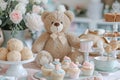 A teddy bear sits at a table surrounded by cupcakes and cakes, A teddy bear\'s tea party birthday celebration, AI Generated Royalty Free Stock Photo