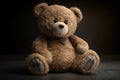 Teddy bear sitting on a floor and on green grass on wodden and nature background Royalty Free Stock Photo