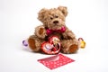 Teddy bear sitting with heart. Valentine's day