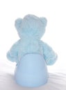 Teddy bear is sitting on the potty Royalty Free Stock Photo