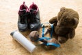 Teddy bear with sneakers, Dumbbells and tape,Sport equipment