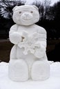 Teddy Bear Snow Sculpture Holding a Snowflake