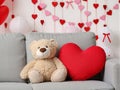 Teddy Bear On Sofa With Heart Decor Royalty Free Stock Photo
