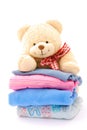 Teddy bear stack of kids clothes