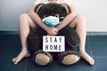 Teddy bear with stay home words Royalty Free Stock Photo