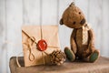 Teddy bear on a suitcase with love messages Royalty Free Stock Photo