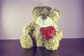 Teddy Bear toy alone on wood Royalty Free Stock Photo