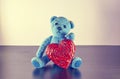 Teddy Bear toy alone on wood Royalty Free Stock Photo