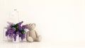 Teddy bear with vase of purple and bird cage in kid room for artwork - 3D rendering Royalty Free Stock Photo