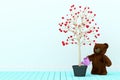 Teddy Bear Watering a tree of Love